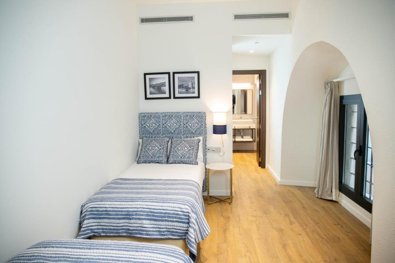 Nqn Aparts & Suites Sevilla Sevilha Exterior foto