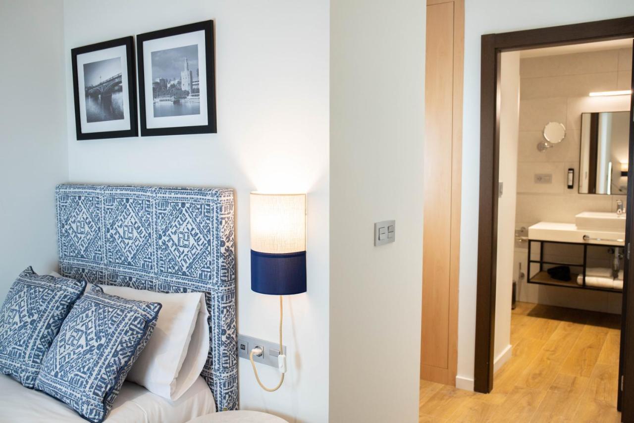 Nqn Aparts & Suites Sevilla Sevilha Exterior foto